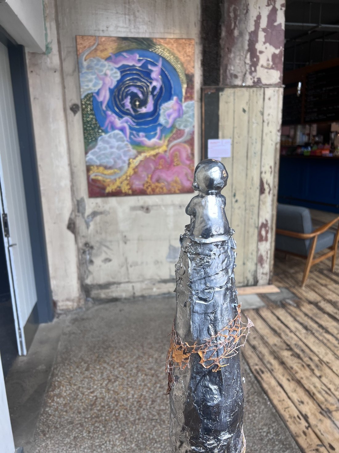 You Are Here, Somehow installed at SEESAW, with the mirror-polished resin figure on its sediment column